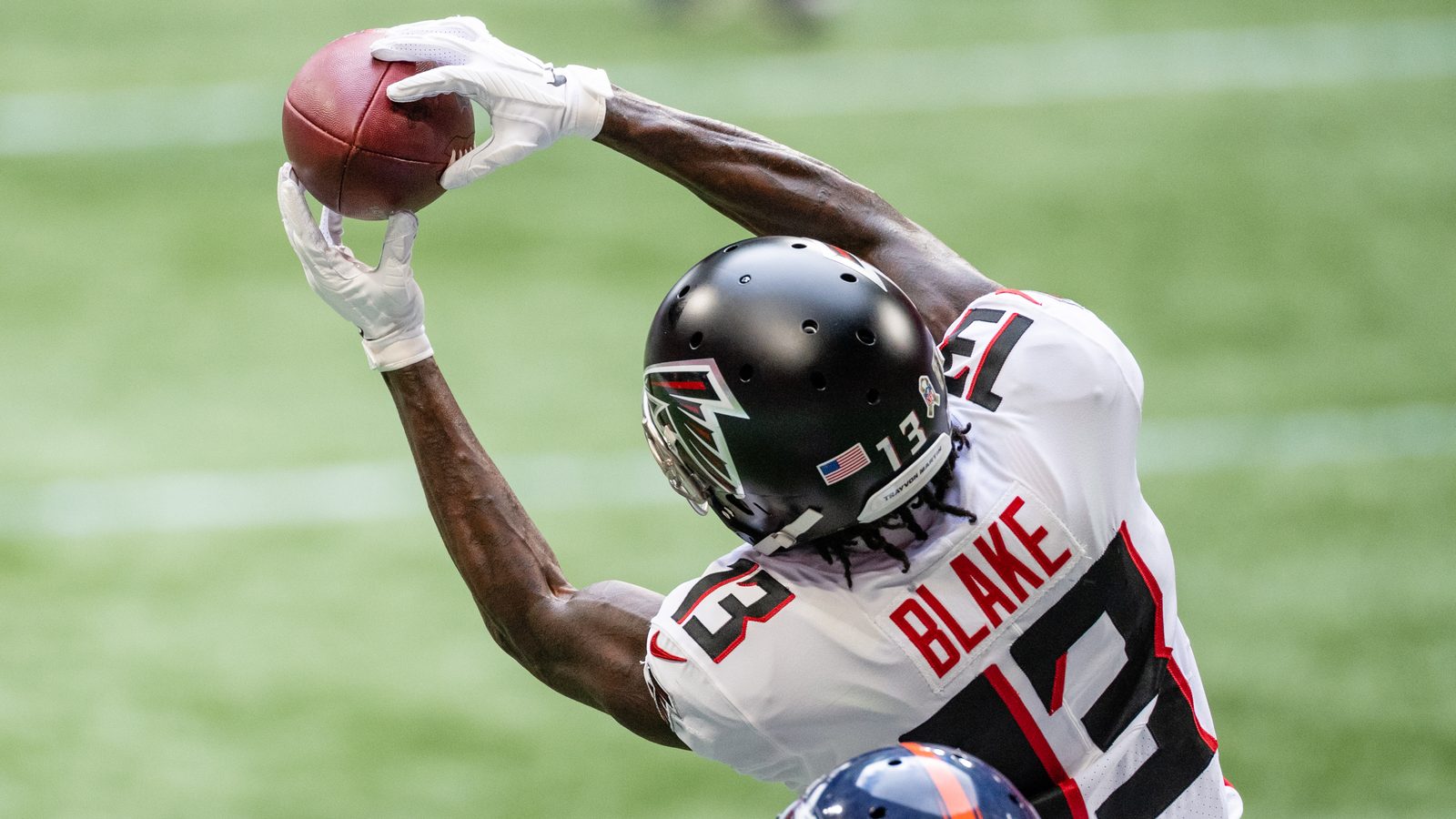 Christian Blake making a one-handed catch during an NFL game